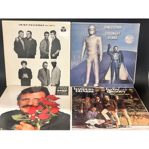 2116 - A collection of vinyl LP records to include The Proclaimers, Elton John, Prefab Sprout, The Beatles,... 