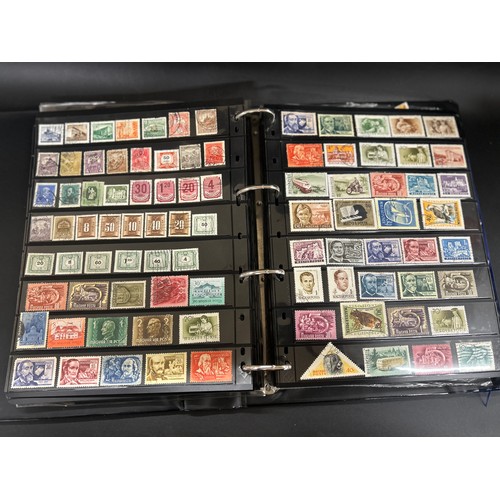 2153 - An album of 20th Century world stamps, to include Canada, Australia, Guernsey, Netherlands, India, I... 