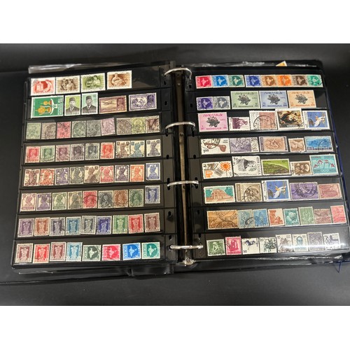 2153 - An album of 20th Century world stamps, to include Canada, Australia, Guernsey, Netherlands, India, I... 