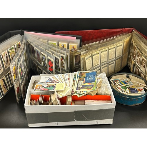 2155 - A large collection of cigarette and tea cards, loose and in albums