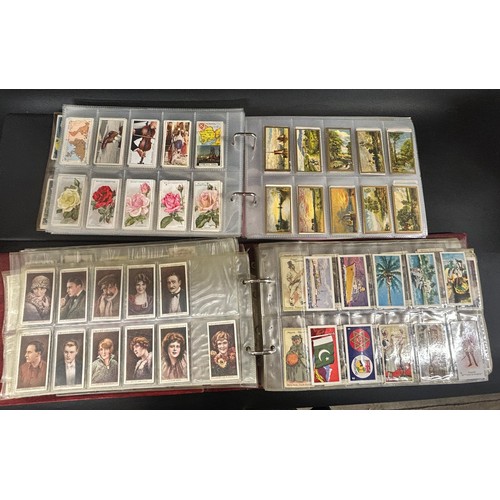 2155 - A large collection of cigarette and tea cards, loose and in albums