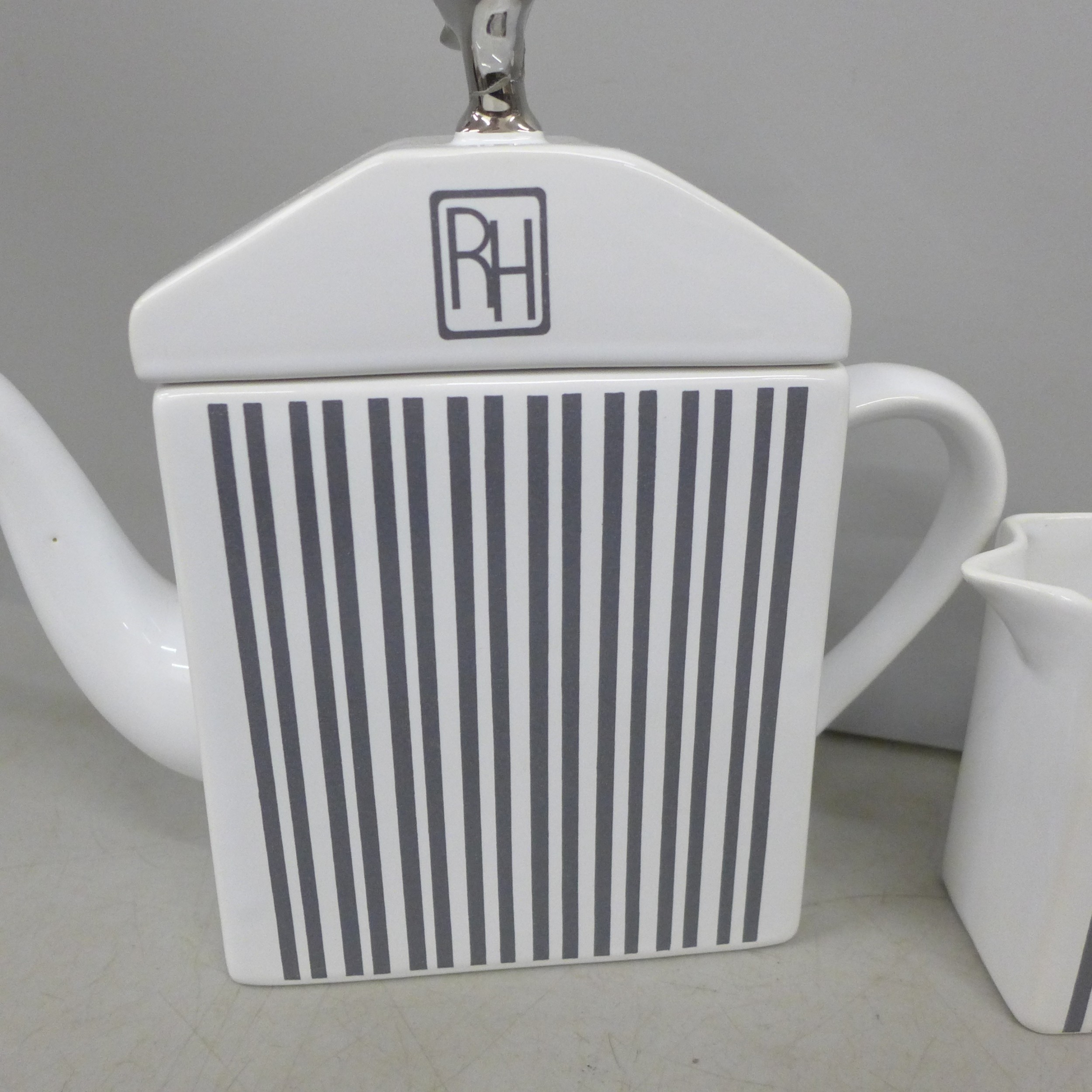 A Rising Hawk Motor Car porcelain three piece tea service, by J&G ...