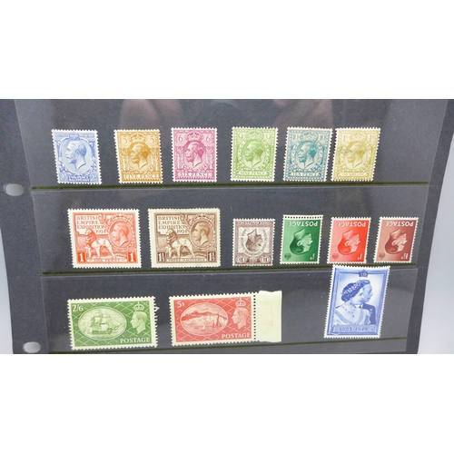 2213 - Stamps; a stocksheet of mint GB stamps, Queen Victoria to King George VI