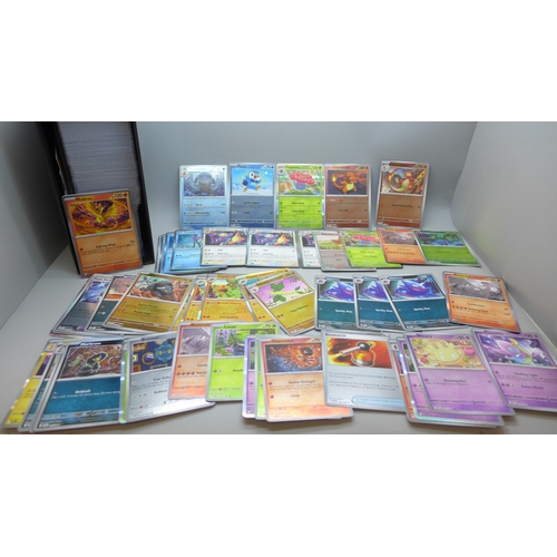 2260 - A large collection of over 650 Phantasmal Flames Pokémon cards in a collectors box, includes Hologra... 