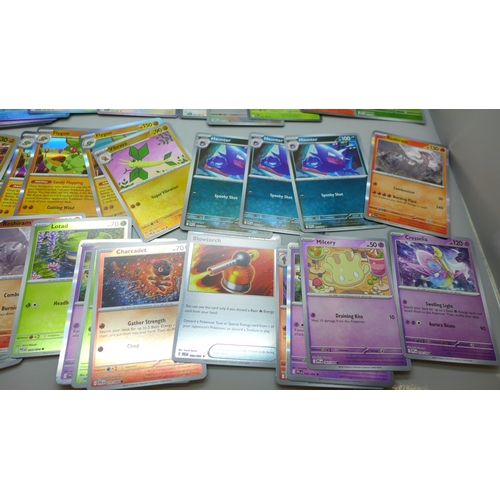 2260 - A large collection of over 650 Phantasmal Flames Pokémon cards in a collectors box, includes Hologra... 