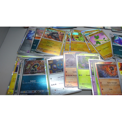2260 - A large collection of over 650 Phantasmal Flames Pokémon cards in a collectors box, includes Hologra... 
