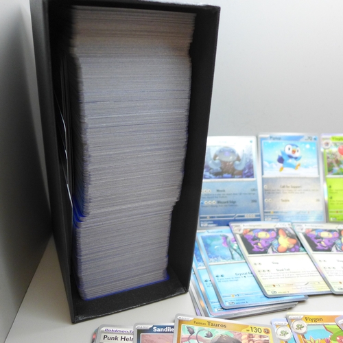 2260 - A large collection of over 650 Phantasmal Flames Pokémon cards in a collectors box, includes Hologra... 