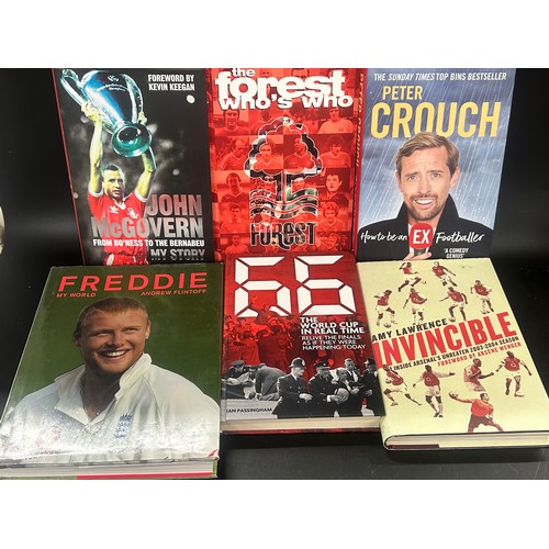 2133 - A collection of football books, etc.