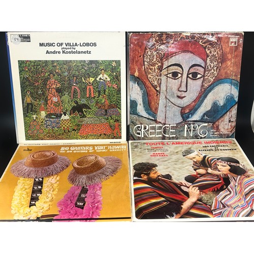 2135 - Approximately 75 pop and rock LP records, also a vintage case, Paul McCartney, UB40, etc.