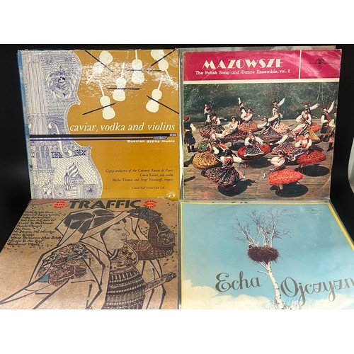 2135 - Approximately 75 pop and rock LP records, also a vintage case, Paul McCartney, UB40, etc.