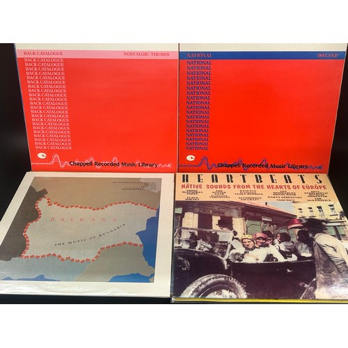 2135 - Approximately 75 pop and rock LP records, also a vintage case, Paul McCartney, UB40, etc.