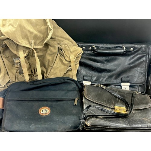2137 - A collection of vintage leather travel bags and holdalls, from 1970s onwards