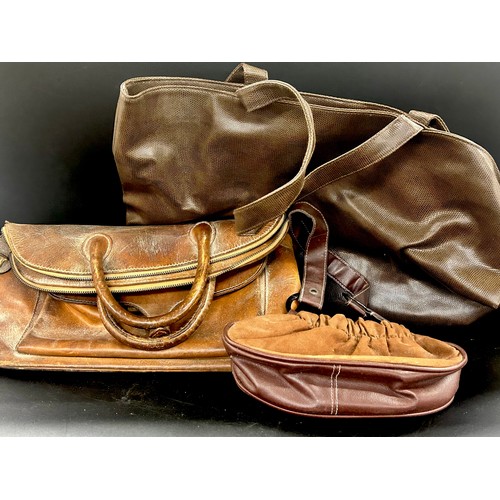 2137 - A collection of vintage leather travel bags and holdalls, from 1970s onwards
