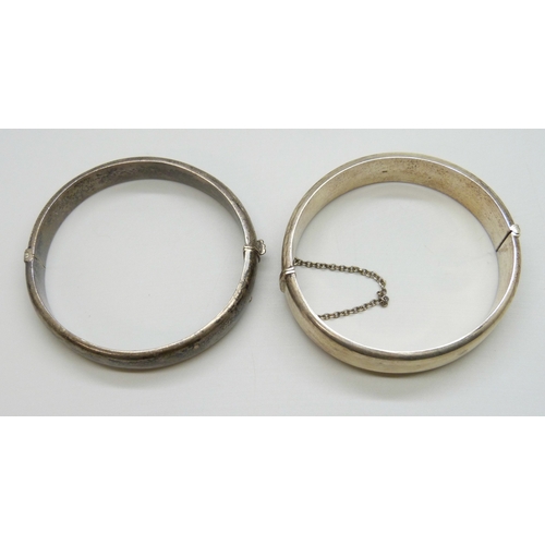 7014 - Two silver bangles, 45g total