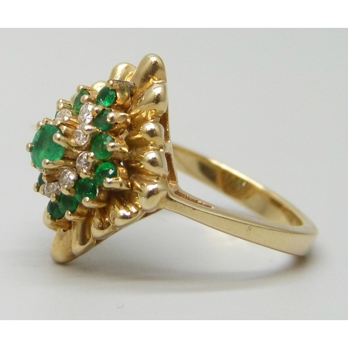 7015 - A 14ct gold, diamond and emerald cluster ring, marked 14KP, 4.7g, M