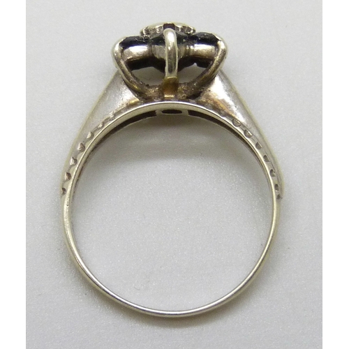 7027 - A 9ct gold white gold, sapphire and diamond ring, 2.7g, L