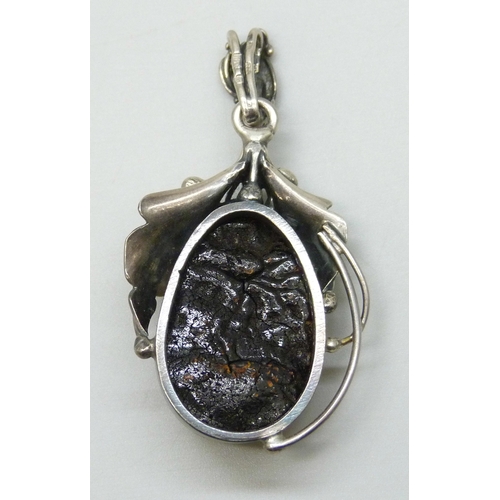 7030 - A Polish silver and amber pendant, 12g, 5.5cm including bail
