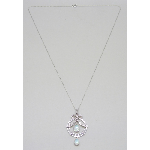 7035 - A 9ct white gold, diamond and opal pendant on a 10k white gold chain, 3.5g, 3.9cm including bail
