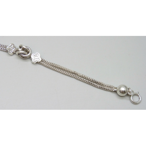 7038 - A white metal Albertina chain with tassel, 26.5cm including tassel, 16.4g