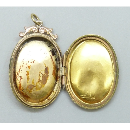 7042 - A 9ct gold back and front locket, a/f, 4.4g