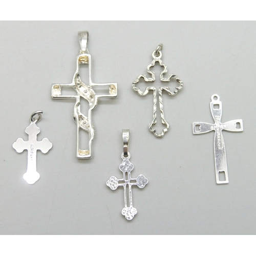 7052 - Four silver cross pendants including Andreas Daub, and an unmarked cross pendant, 7g