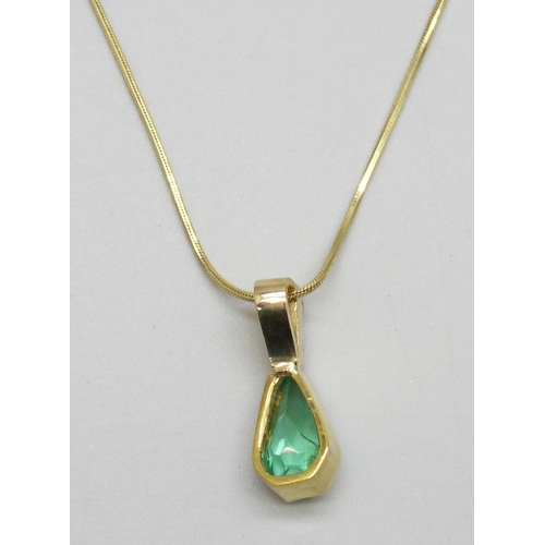 7055 - A yellow metal diamond and emerald pendant, on an 18ct gold chain, 5.4g total weight, 45cm, 1.8cm pe... 