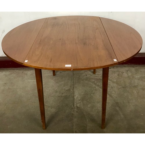 19D - A teak drop-leaf table