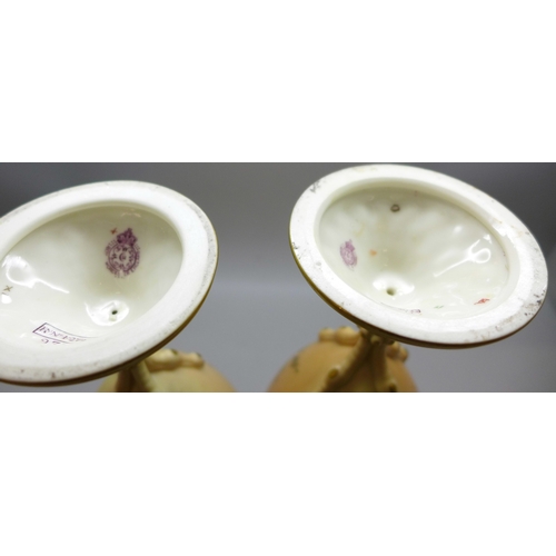 2007 - A pair of 2314 Royal Worcester Blush Ivory vases, 1906, (one a/f, chip on the rim), 20cm