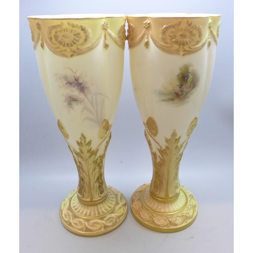 2008 - A matched pair of early 20th century hand decorated Royal Worcester chalice vases, signed Jas Stinto... 