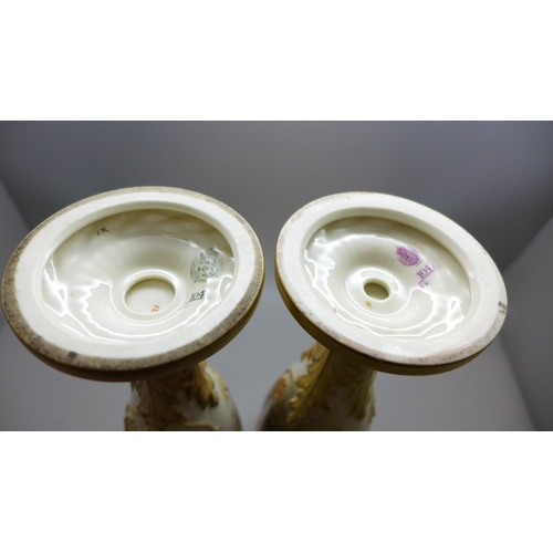 2008 - A matched pair of early 20th century hand decorated Royal Worcester chalice vases, signed Jas Stinto... 