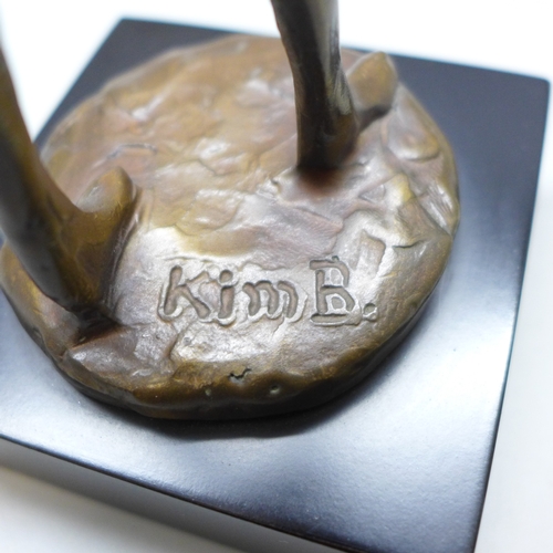 2009 - A bronze figure of a female violinist, Bernard Kim, signed B Kim, 27.5cm