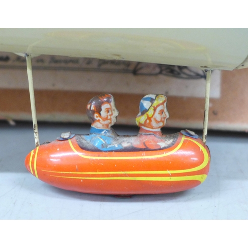 2027 - A German made tin-plate model Zeppelin toy, boxed
