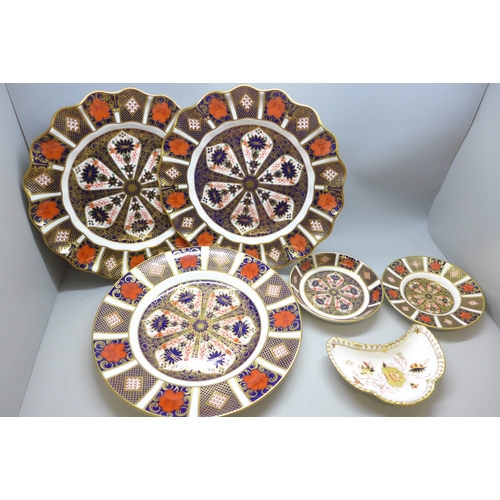 2037 - A pair of Royal Crown Derby 1128 Imari wavy edge plates, a similar plate, dish and saucer, and anoth... 