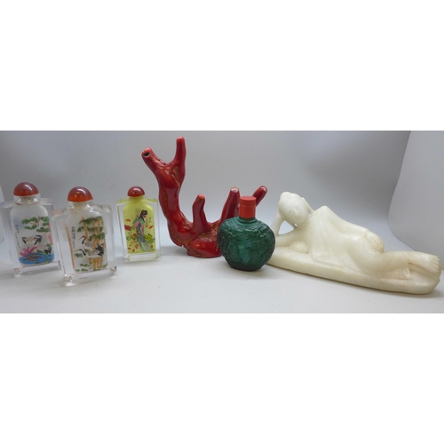 2041 - Four oriental snuff bottles, a carved alabaster figure and a coral piece