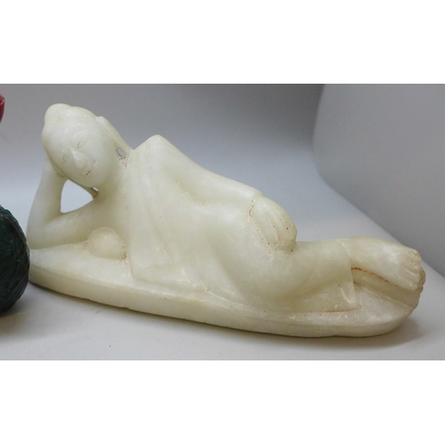2041 - Four oriental snuff bottles, a carved alabaster figure and a coral piece