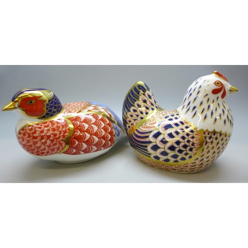 2042 - Two Royal Crown Derby paperweights, both with silver tone stoppers - a hen and a pheasant