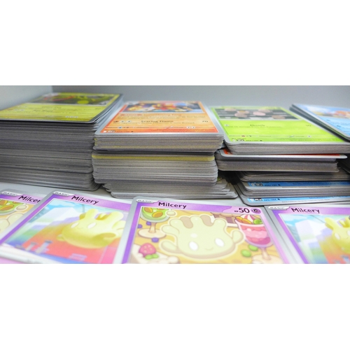 An extensive collection of 750+ Pokmon cards including over 100  Holographic cards including Black S