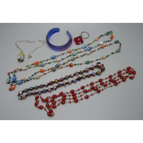 7069 - A collection of glass jewellery including Murano and millefiori