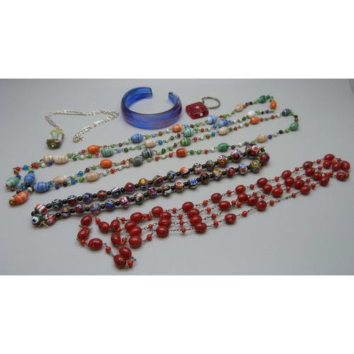 7069 - A collection of glass jewellery including Murano and millefiori