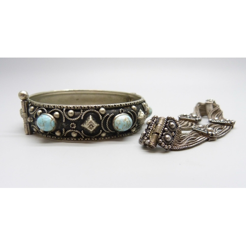 7078 - An Eastern silver bracelet, 26g, and a metal bangle