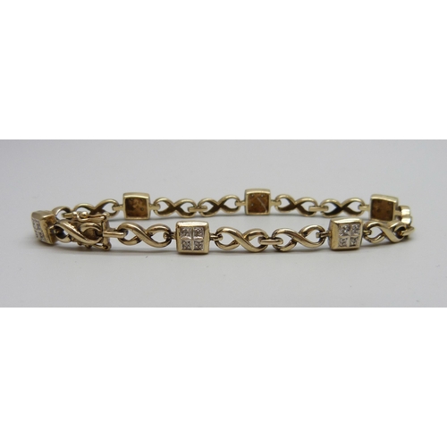 7088 - A 9ct gold and diamond bracelet, 10.7g, 18.3cm, boxed