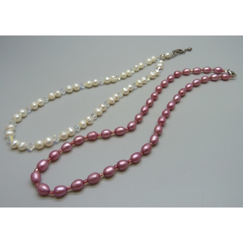 7092 - Two pearl necklaces with silver clasps, 52g total