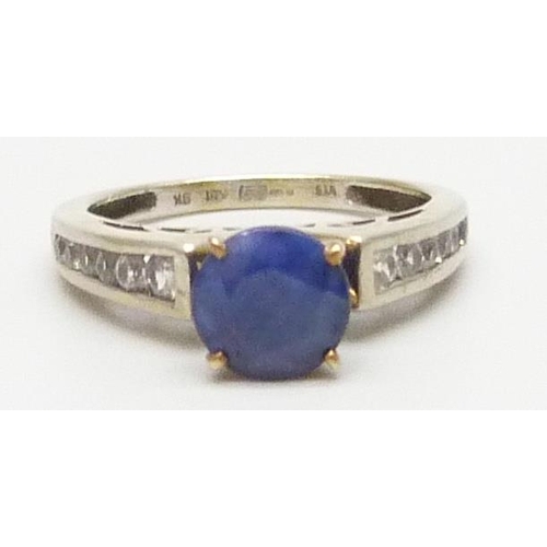 7100 - A silver gilt sapphire and white stone ring, the setting section 9ct gold, 2.5g, L/M