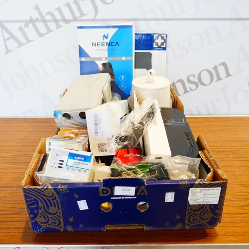 6028 - A box of miscellaneous items to include medical supports, biscuit barrell, assortment of plugs, etc.... 