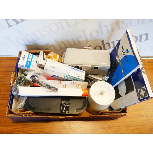 6028 - A box of miscellaneous items to include medical supports, biscuit barrell, assortment of plugs, etc.... 