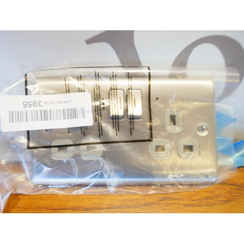 6028 - A box of miscellaneous items to include medical supports, biscuit barrell, assortment of plugs, etc.... 