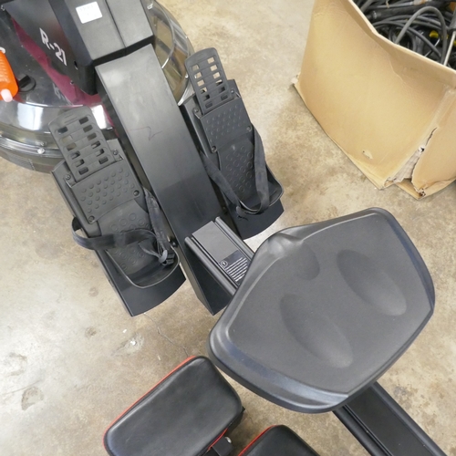 An Adidas R-21 self generating water rowing machine with LED lighting ...