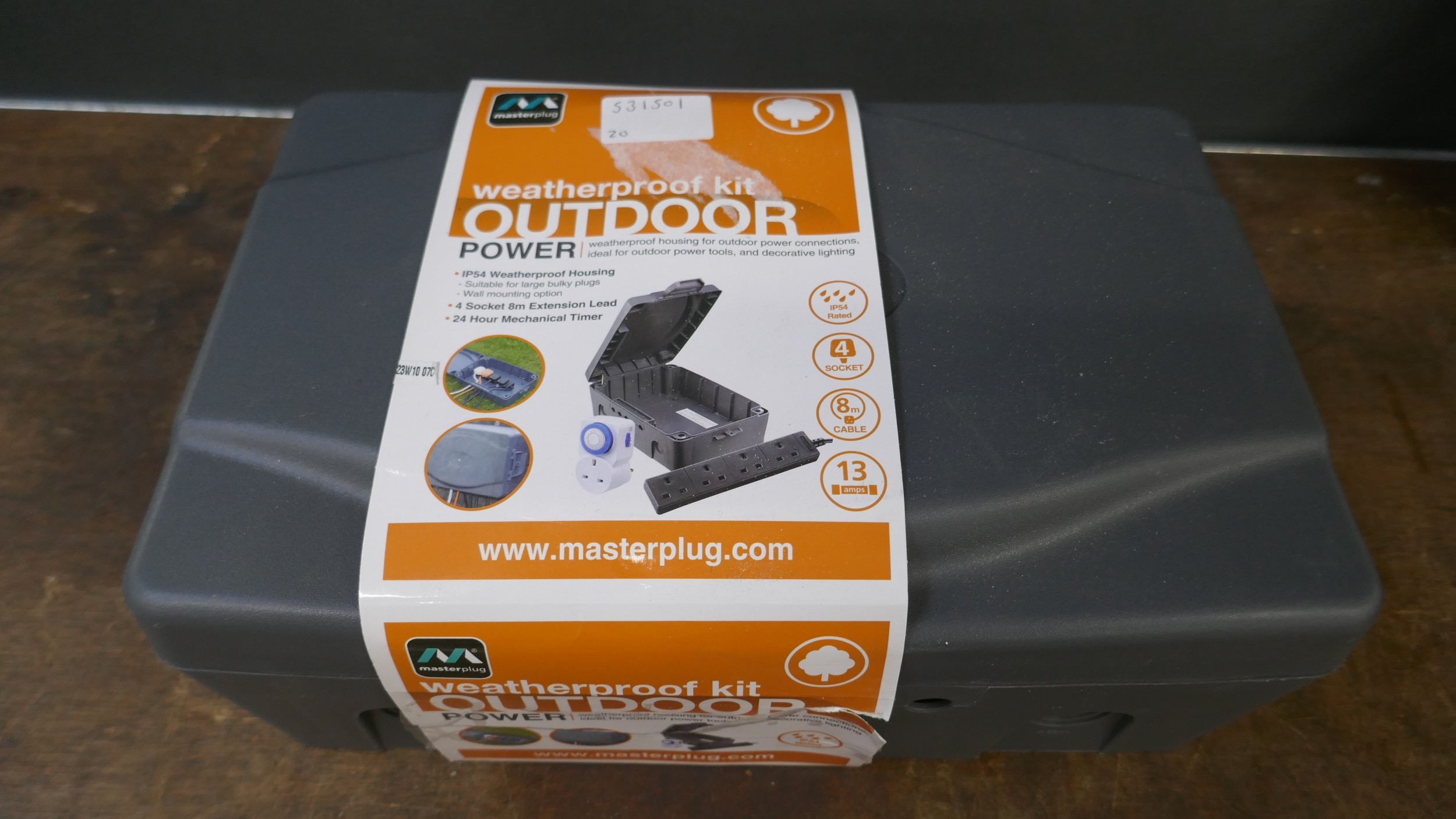 A Masterplug outdoor power, weatherproof kit and a cased Mac Allister ...