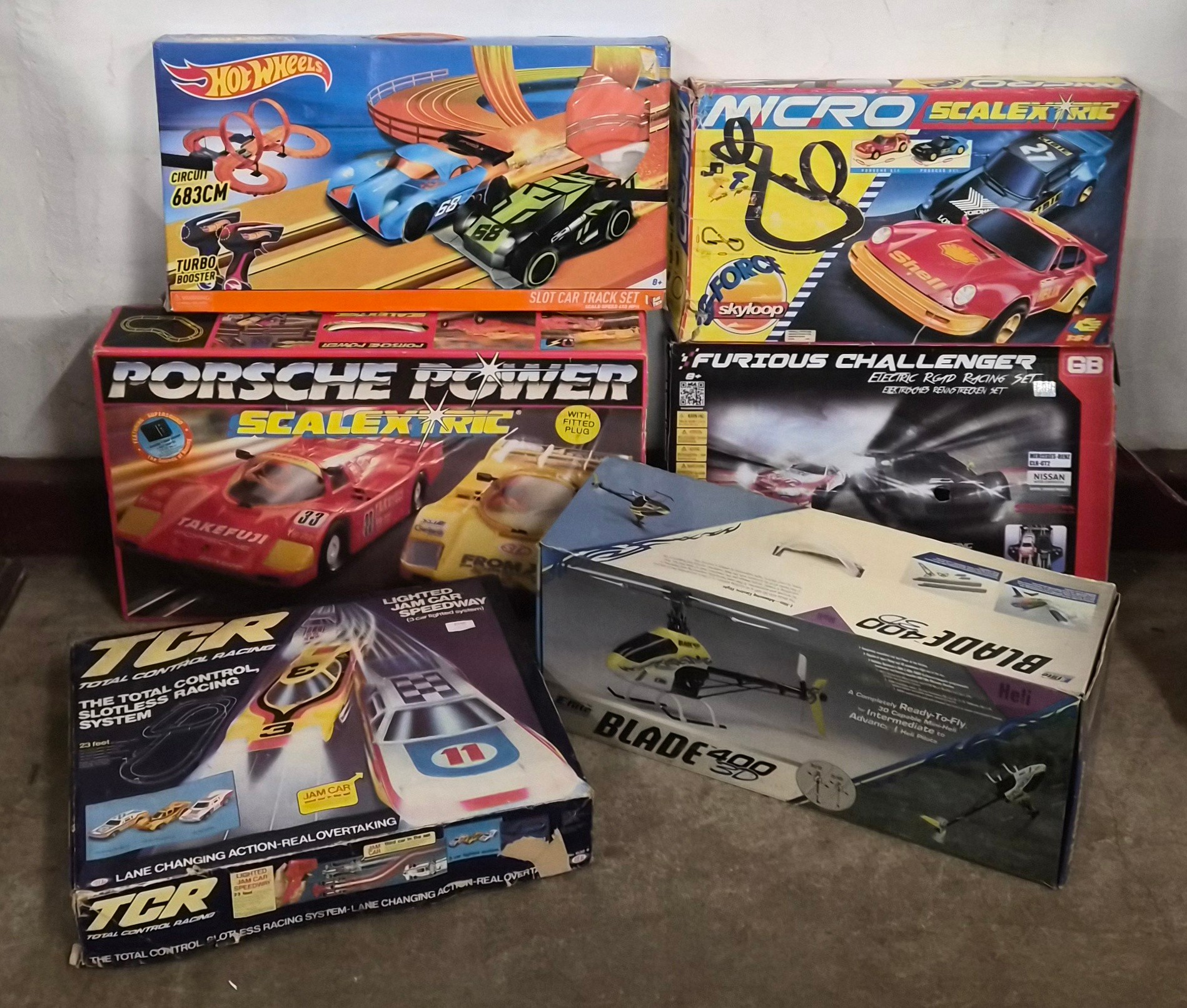 Two Scalextric; Porsche Power and Micro, three other car racing games ...