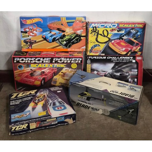 Two Scalextric; Porsche Power and Micro, three other car racing games ...